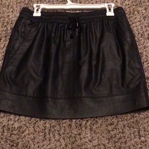 Leather mini skirt. (Not real leather)